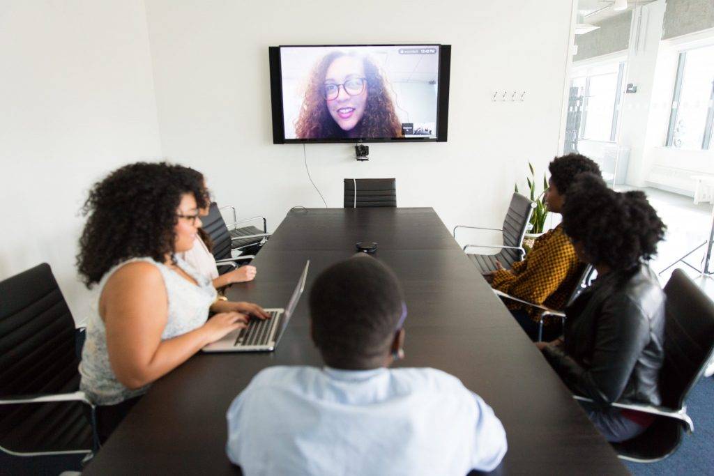 Team using a video conference room